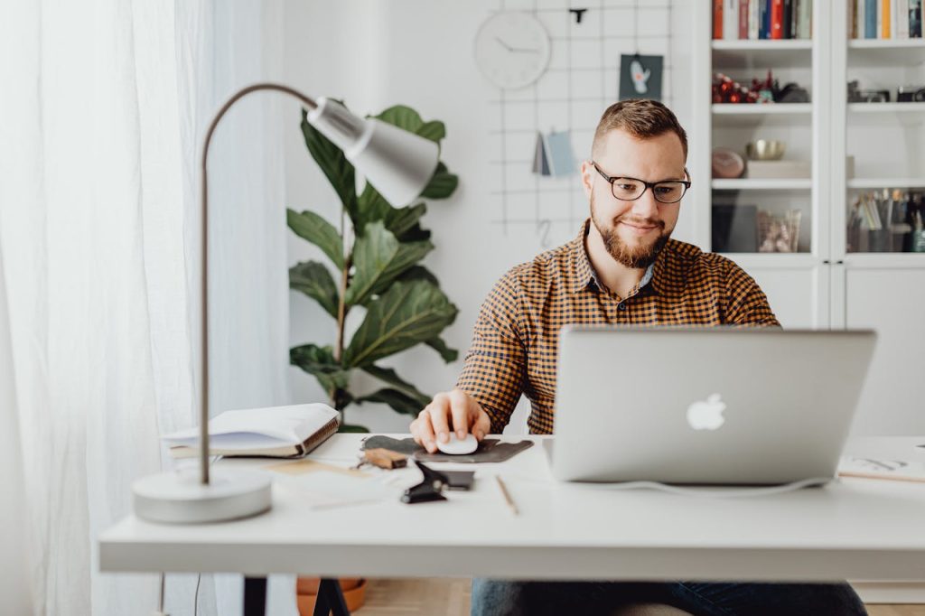 man working on growing his small collections agency