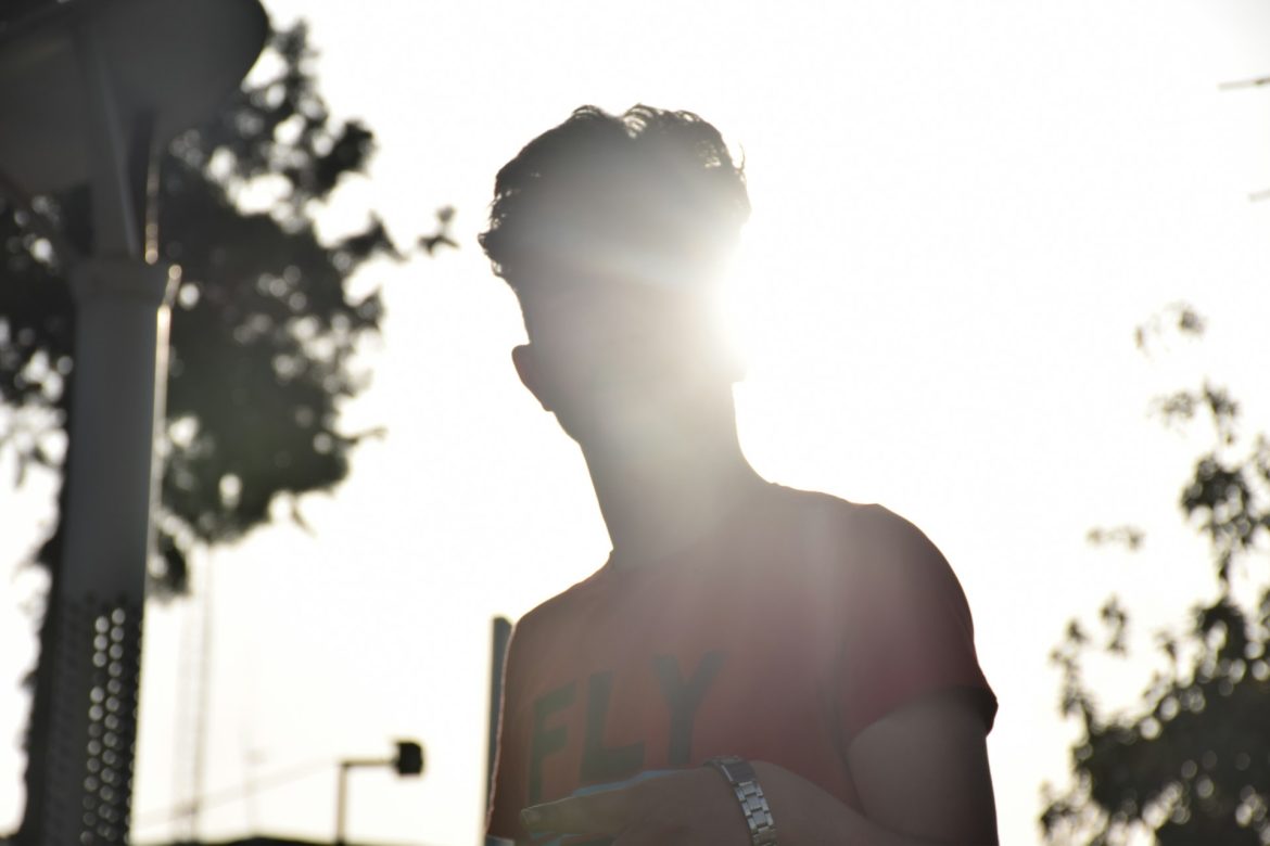 amirhossein-hasani-TLKRTRKXN3U-unsplash silhouette of a person suspected of a crime whose identity will be verified through social media