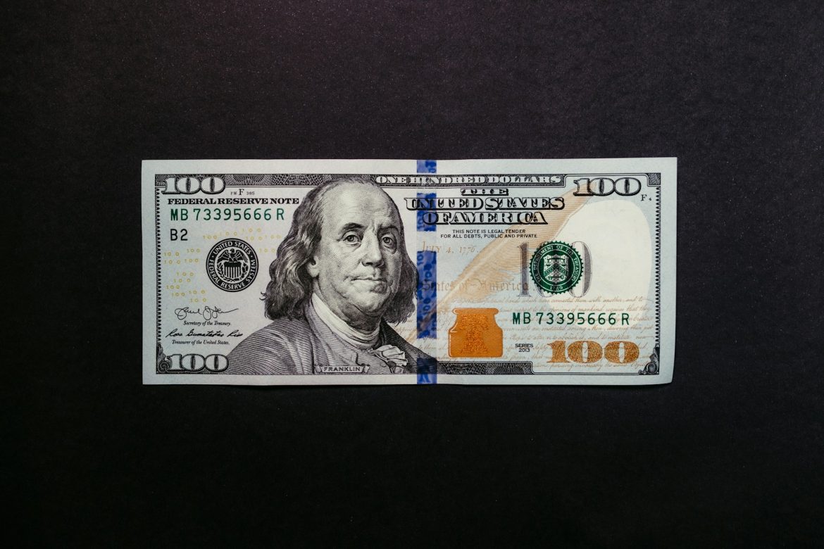 $100 bill representing a money mule scam