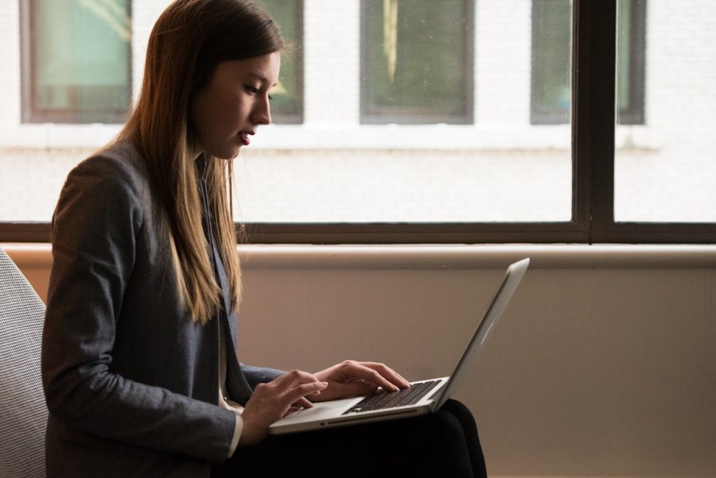 collections agent reviewing debt collections analytics data