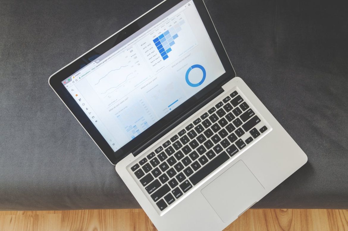 laptop computer displaying metrics used for wholistic debt collection analytics