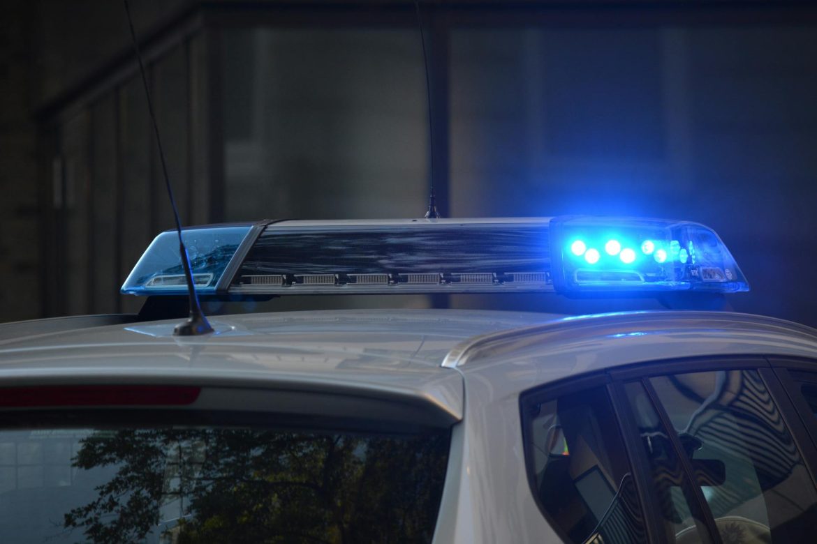 police car arriving at scene of gang bust thanks to SOCMINT data